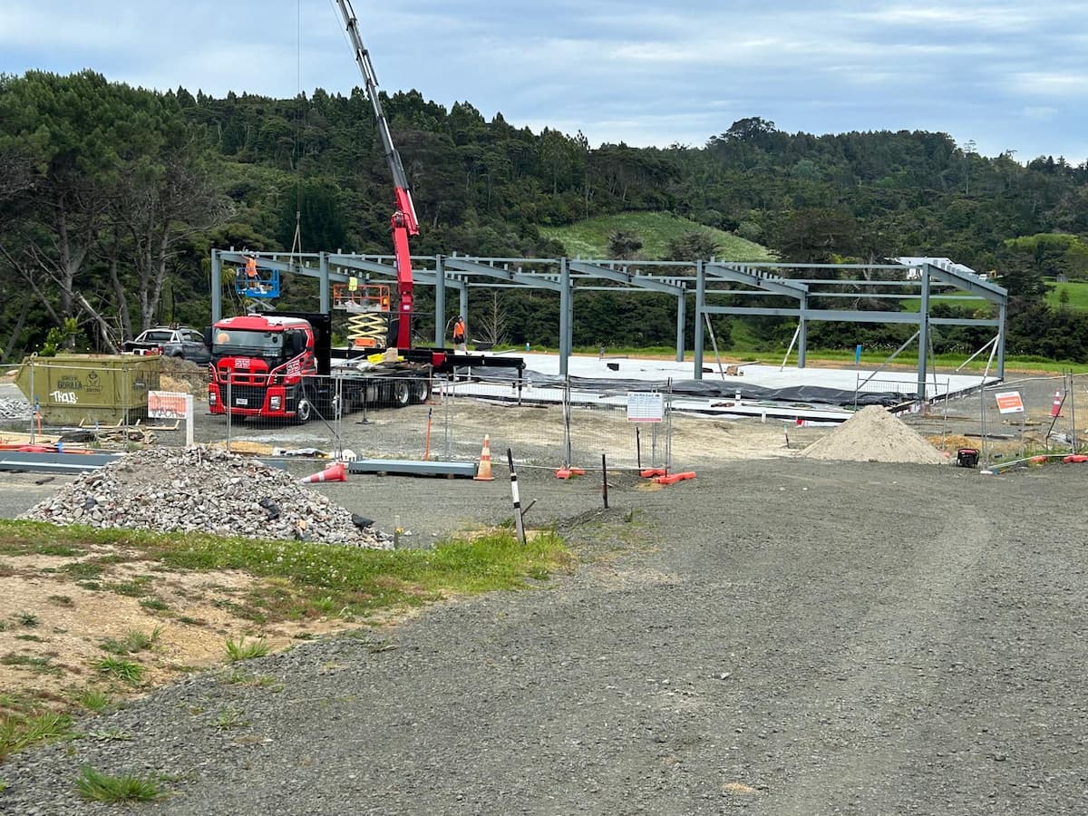 Photo showing the metal framework of the new clubhouse being erected by the building crew.